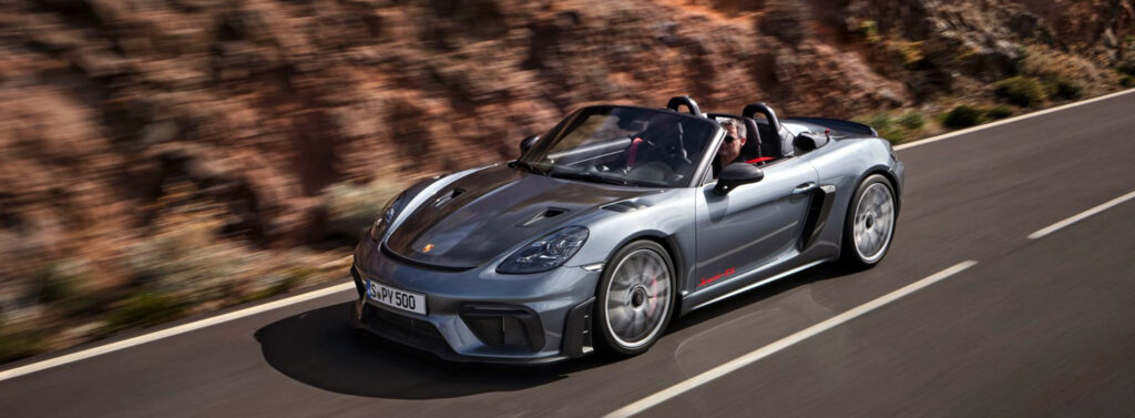 The all-new 2023 Porsche 718 Spyder RS driving on public roads