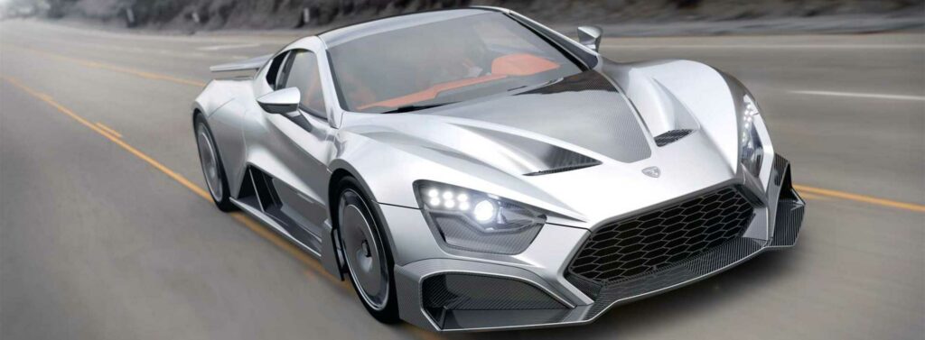 Zenvo hypercar on the road in silver.