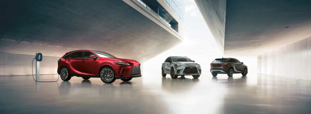 2024 Lexus RX450H+ on display in Red and Silver