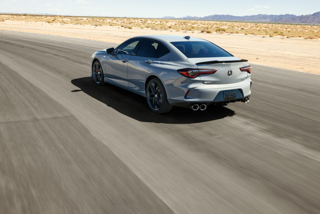 Image showcasing rear quarter profile of 2024 Acura TLX Type S in grey