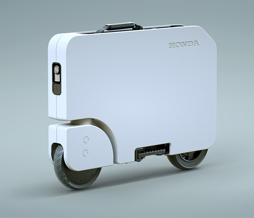 Image showcasing the front quarter profile of the Honda Motocompacto electric scooter folded