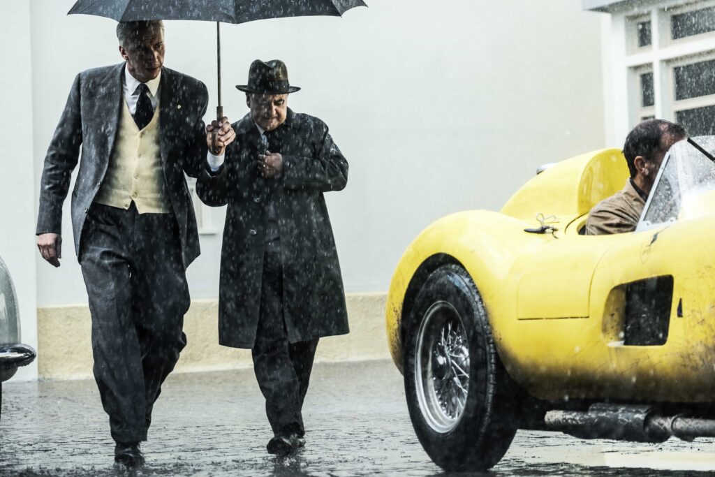 Enzo Ferrari walking in rain