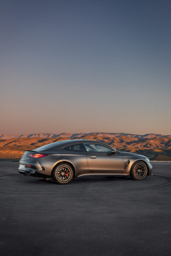 Image showcasing passenger rear quarter profile of the new The Mercedes-AMG CLE Coupe