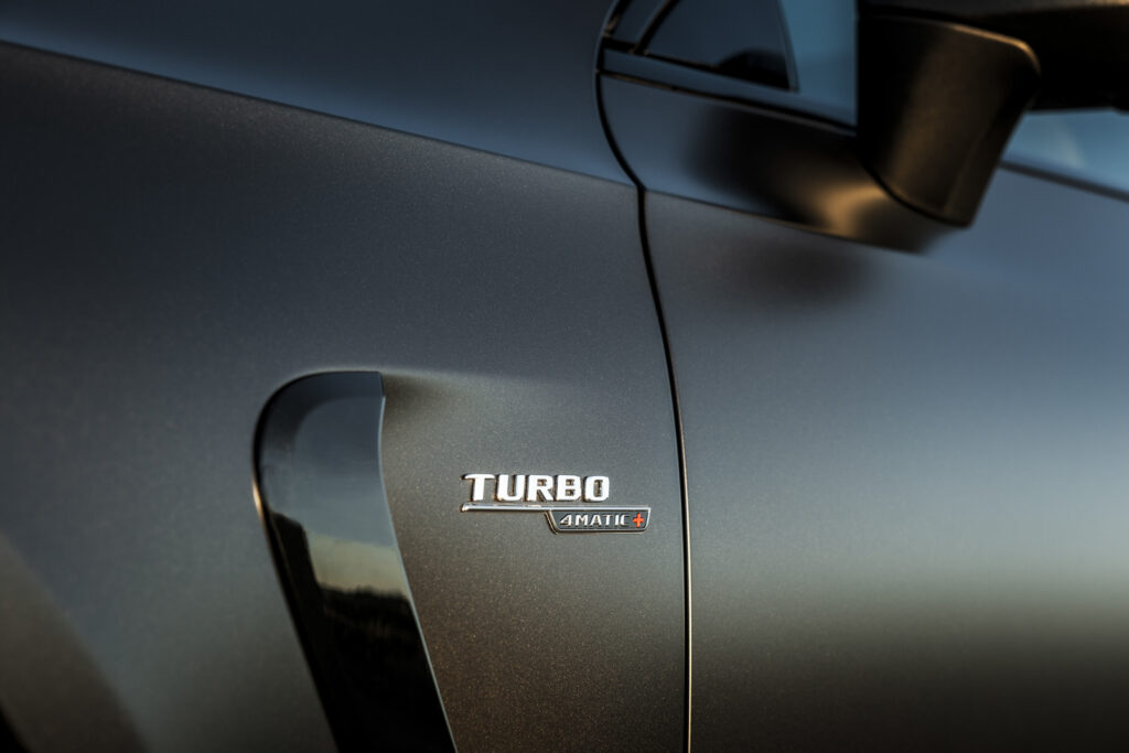 Image showcasing Turbo 4MATIC+ badge of the new The Mercedes-AMG CLE Coupe