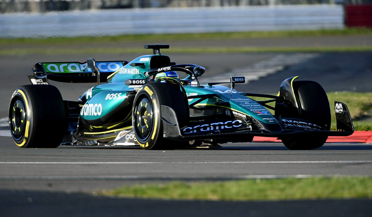 Fernando-Alonso-driving-Aston-Martin-F1-race-car