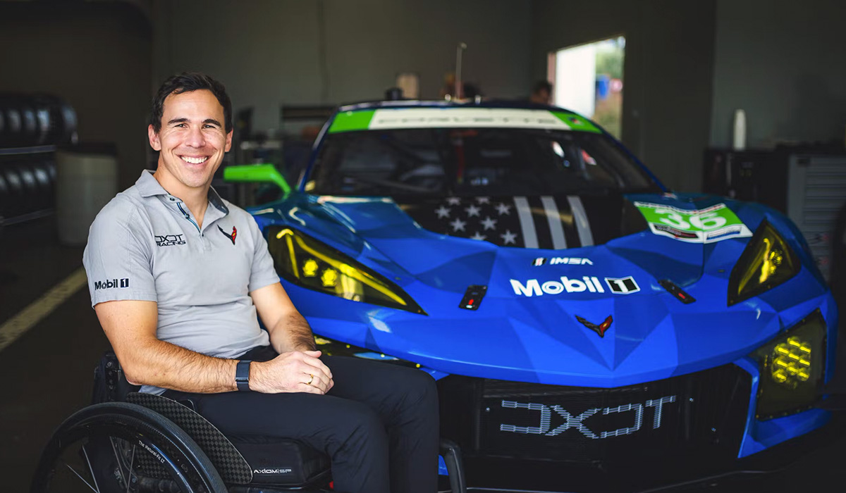 Robert-Wickens-with-DXDT-IMSA-Race-Car-Shared-by-AutomotiveWoman.com